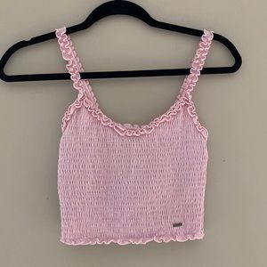 Cropped pretty pink Hollister tank top.